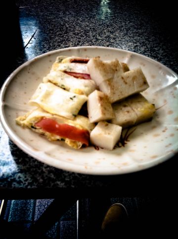 $50ntd breakfast, egg crepe, raddish cake and black tea