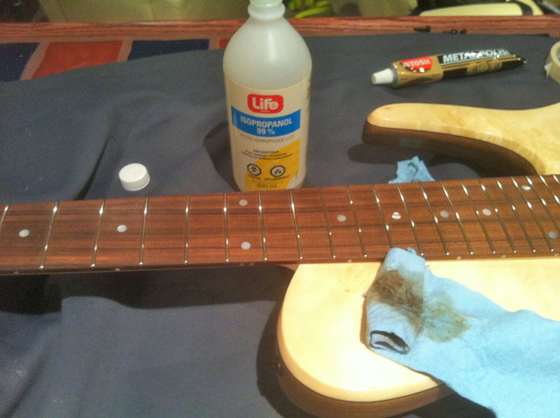 rubbing the fingerboard with alcohol rubbing the fingerboard with alcohol